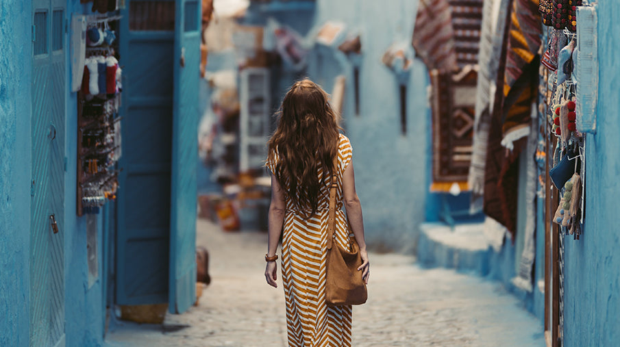 Woman walking through the streets of a local market