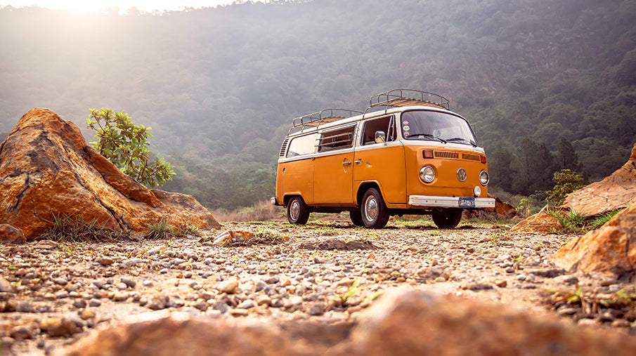 Orange camper van on a roadside
