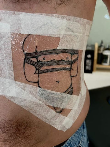 Got my tattoo yesterday and we applied Saniderm After I woke up I  recognised that its leaking at some points What should I do My artist  said I should leave it on