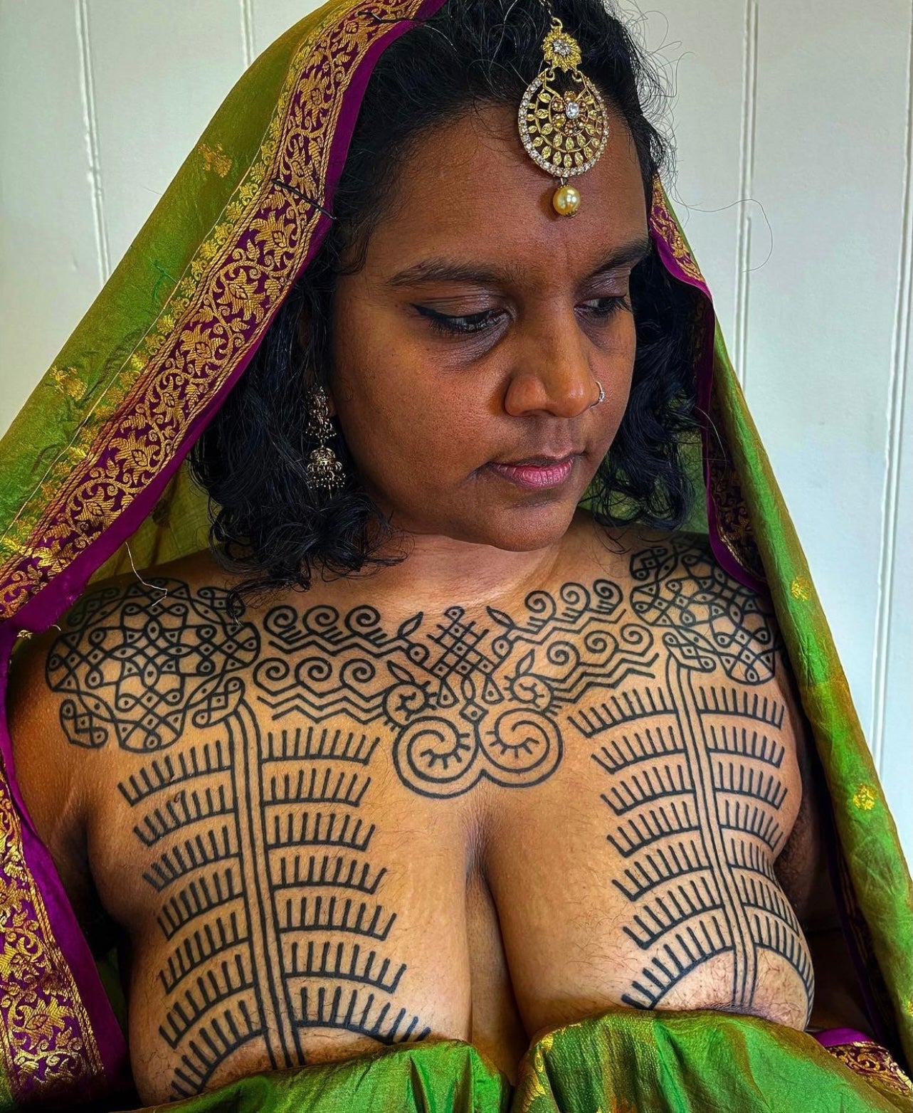 Red indian tattoo | Red indian tattoo, Indian tattoo, Black and grey tattoos