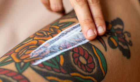 How to Care for Your Tattoo Scabs  Tattoo Goo