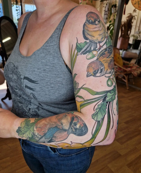 Bird sleeve tattoo