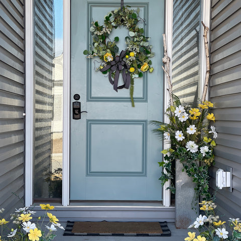 Customer's front door with magnolias flowers