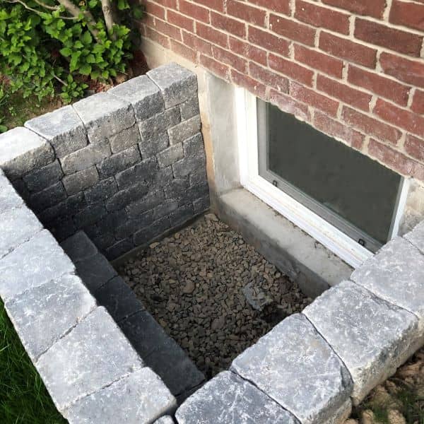 Build or install the egress well walls