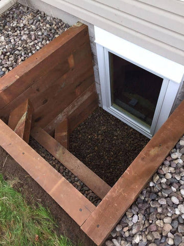Wood material for an egress window well