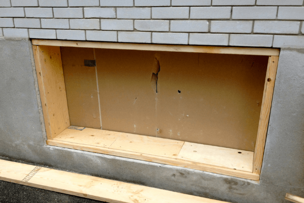 Egress window opening with frame installed