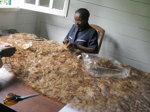 sewing cocoons into textiles