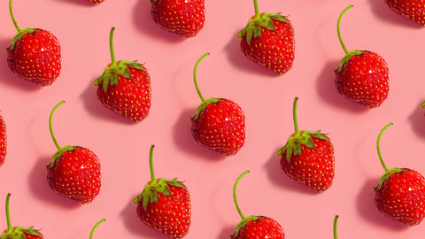 Pop art style fresh strawberries on a pink background