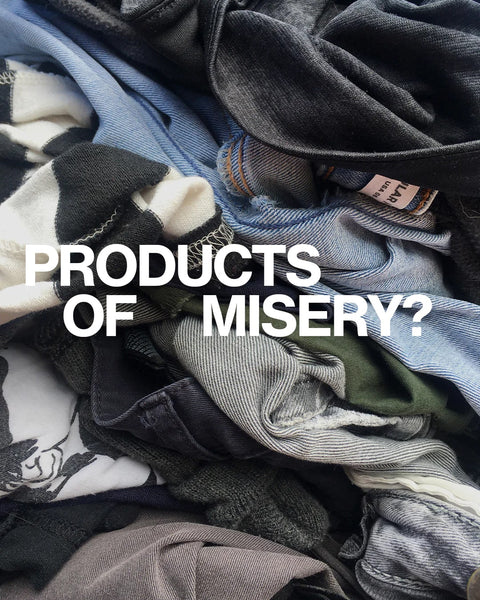 Piles of clothing thrown on top of each other including denim, t-shirts and jeans with "Products of Misery" text overlaid on it