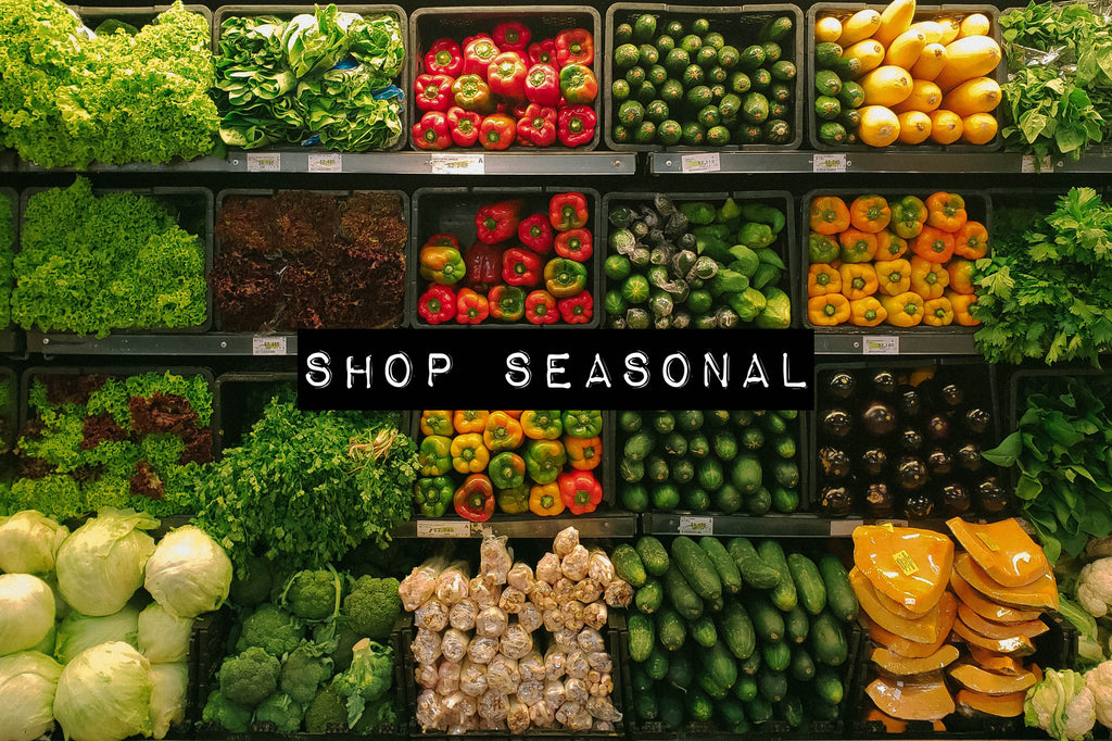 Fresh seasonal fruit and vegetables lined up in a local market with no plastic packaging