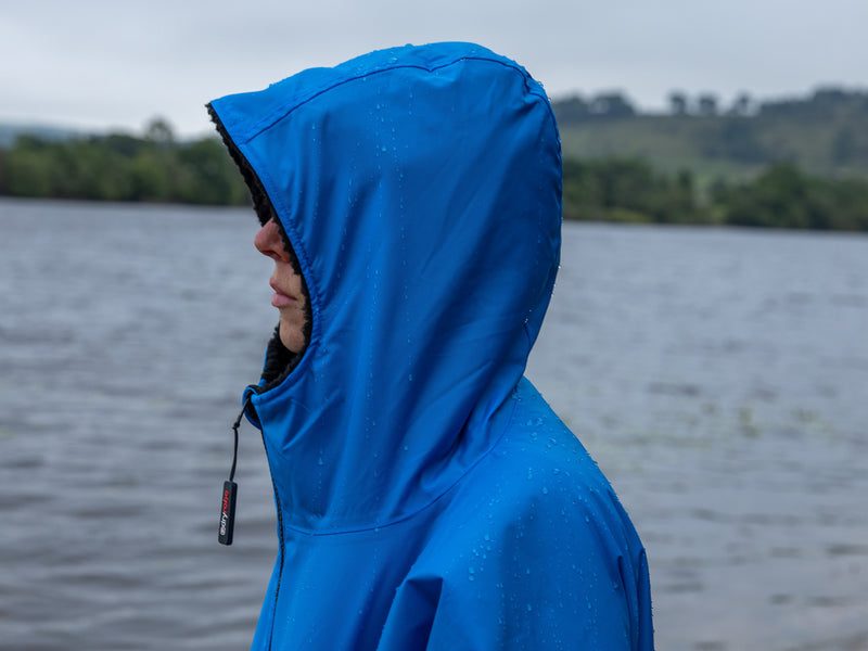 Staying dry in the rain wearing a Cobalt Blue dryrobe® Advance