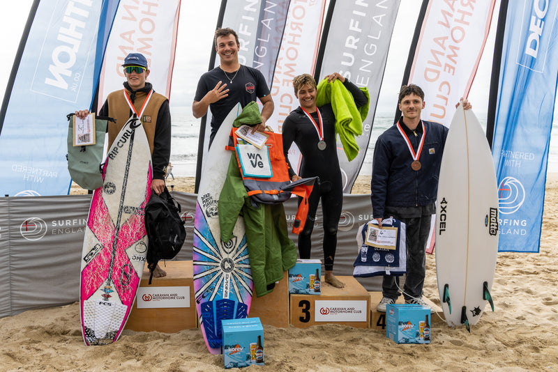 Lukas Skinner stood on the podium at the 2023 English Open Surf Competition at Fistral Beach, Cornwall