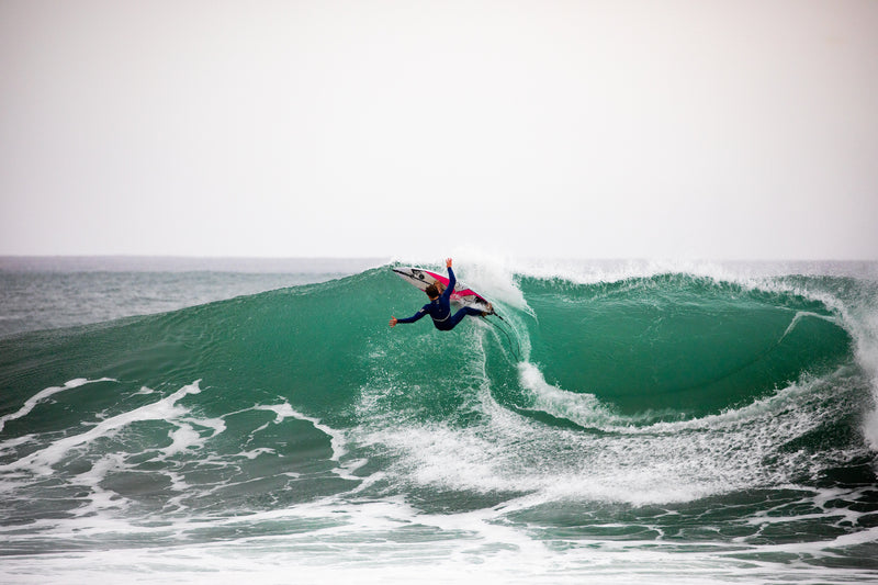 Lukas Skinner shredding on a wave