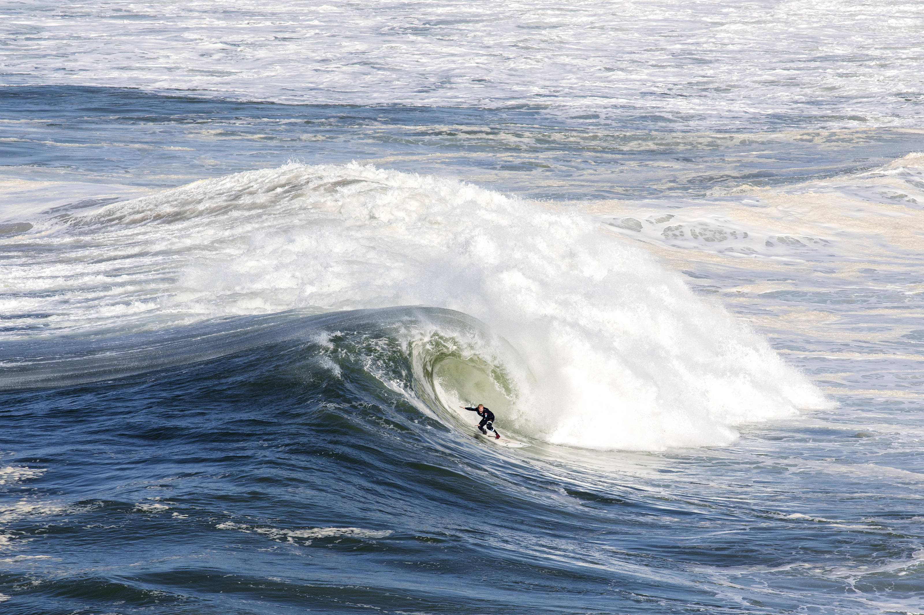 Andrew Cotton surfing at Praia do Norte in Nazare, Portugal November 2017