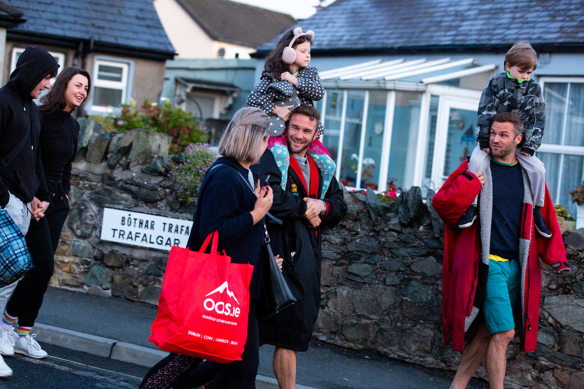 The Happy Pear walking to swimrise in Greystones, Ireland. May 2019