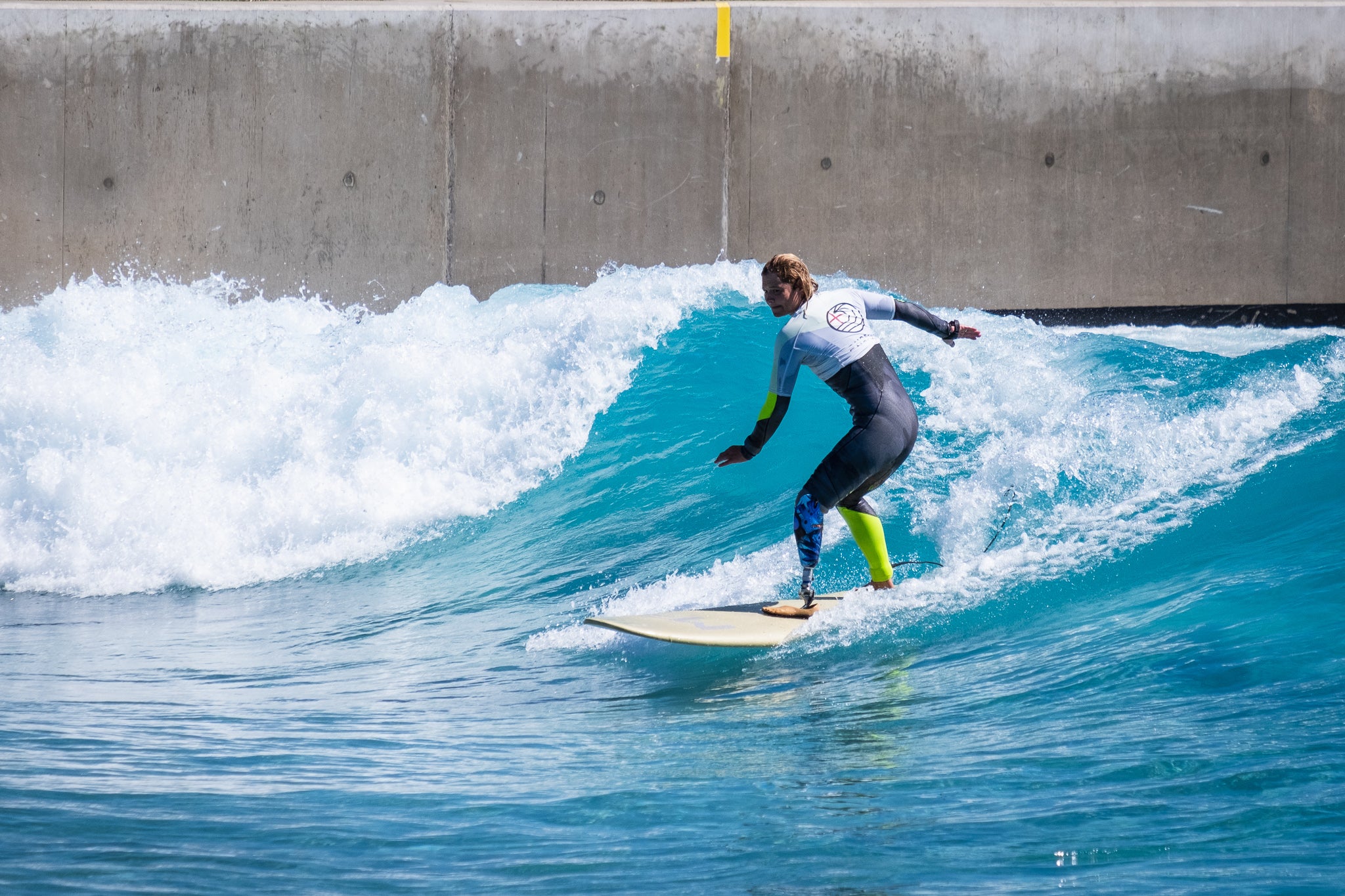 Adaptive Surfer Zoe Smith surfing at The Wave 