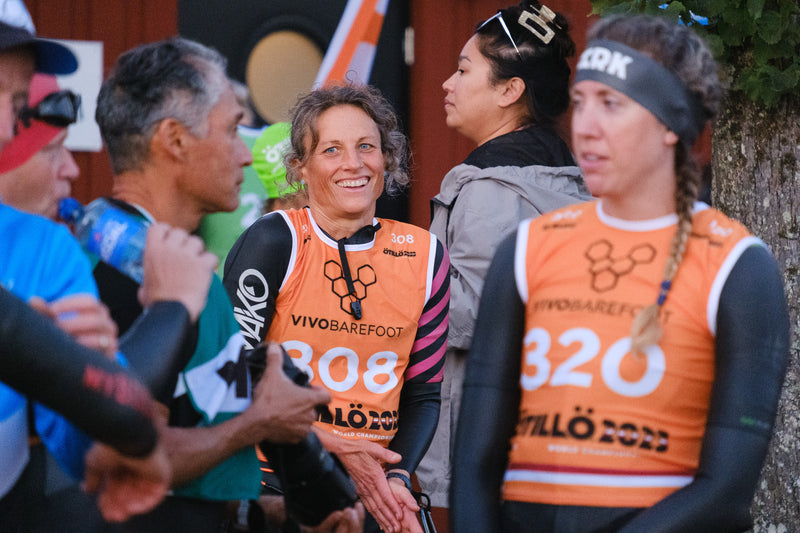 Female swimrunner smiling ahead of the start of the race