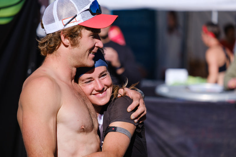 Ryan Atkins and Lindsay Webster embracing after both winning their 15k Races at OCRWC