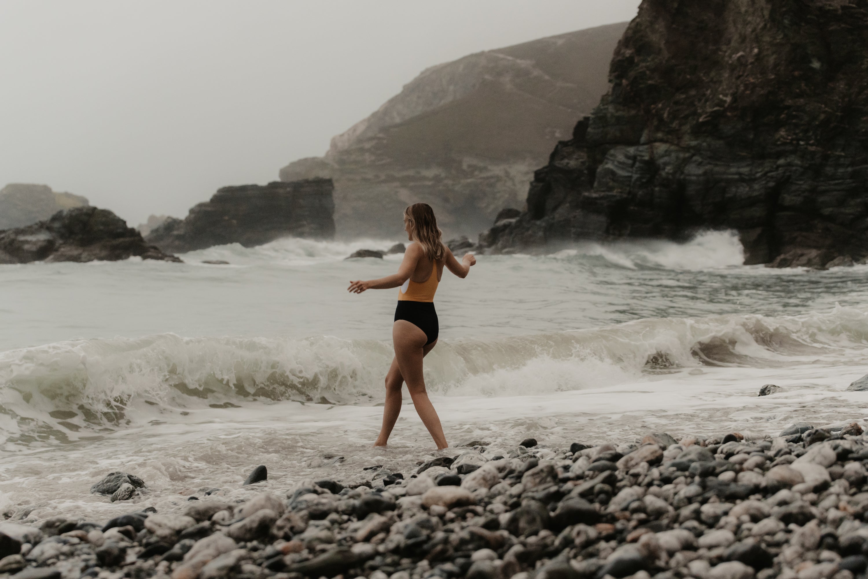 Sophie Hellyer walking into the sea