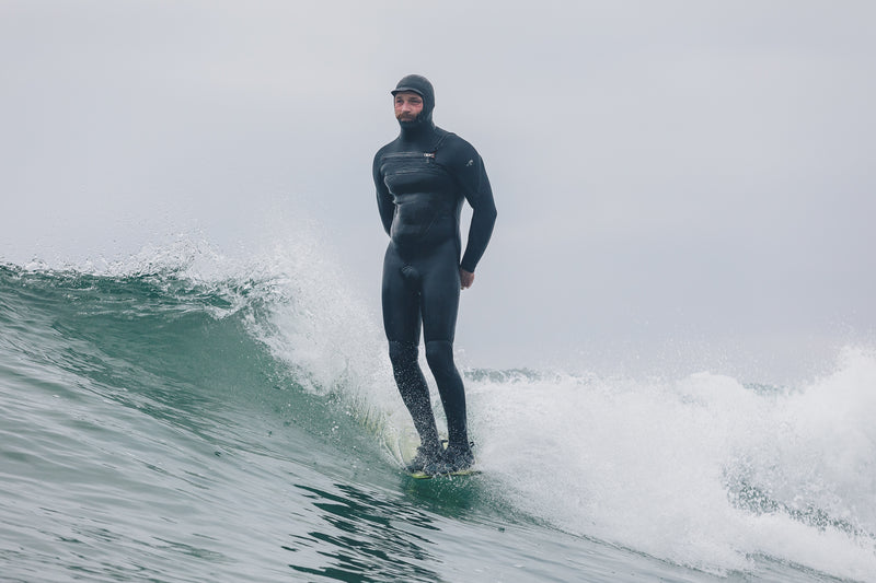 Ben Skinner nose riding on a longboard