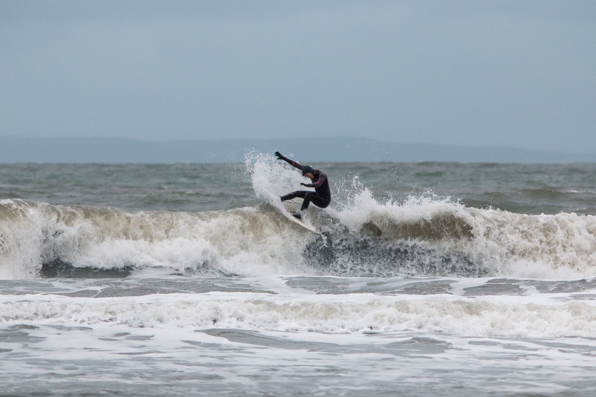 Lucy Campbell surfing at Croyde Beach