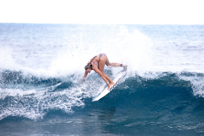 Izzi Gomez Surfing. Photo by Elise Crigar