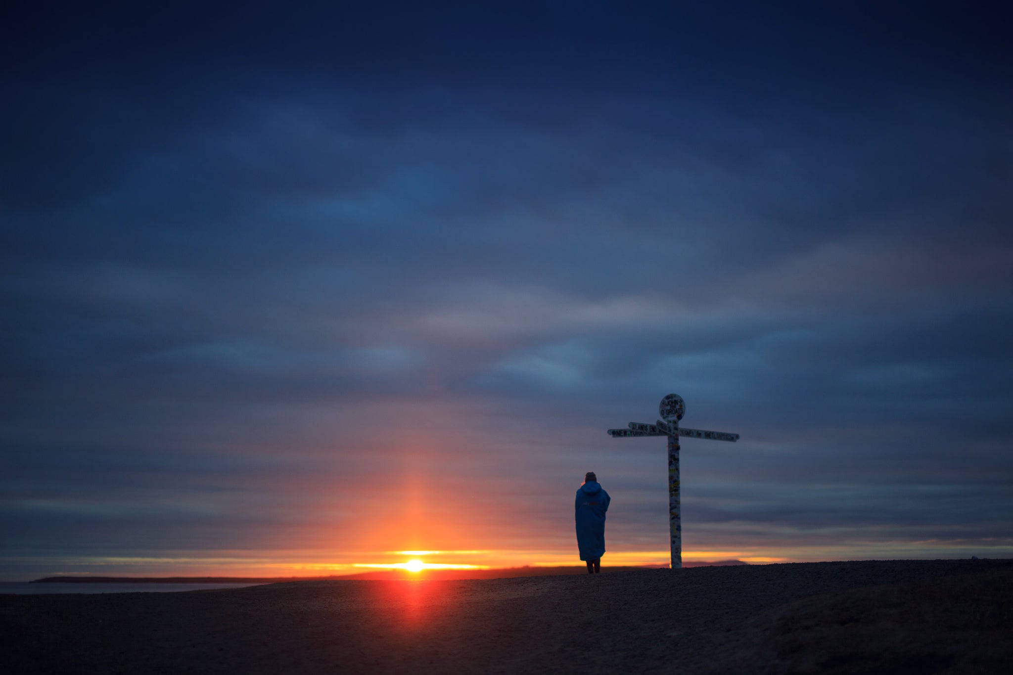 Cal Major at John O'Groats after completing her record-breaking SUP