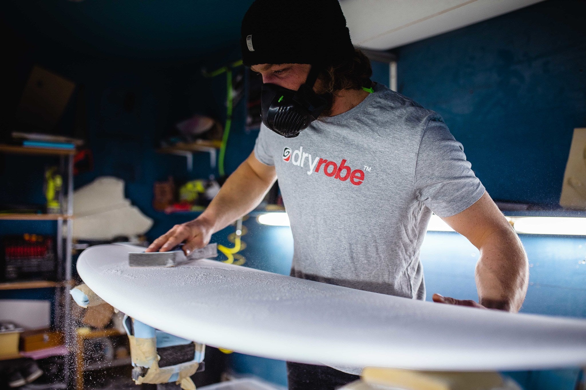 Ben Skinner shaping a surfboard