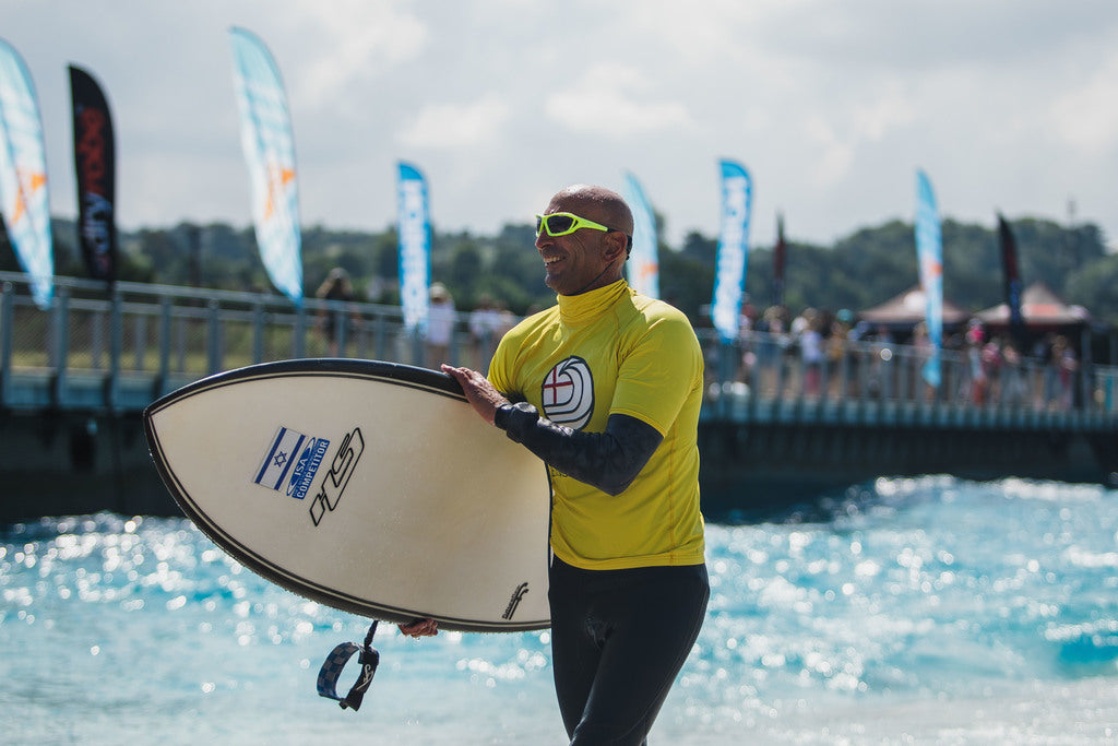 Adaptive surfer getting out of the water at 2021 dryrobe English Adaptive Surfing Open