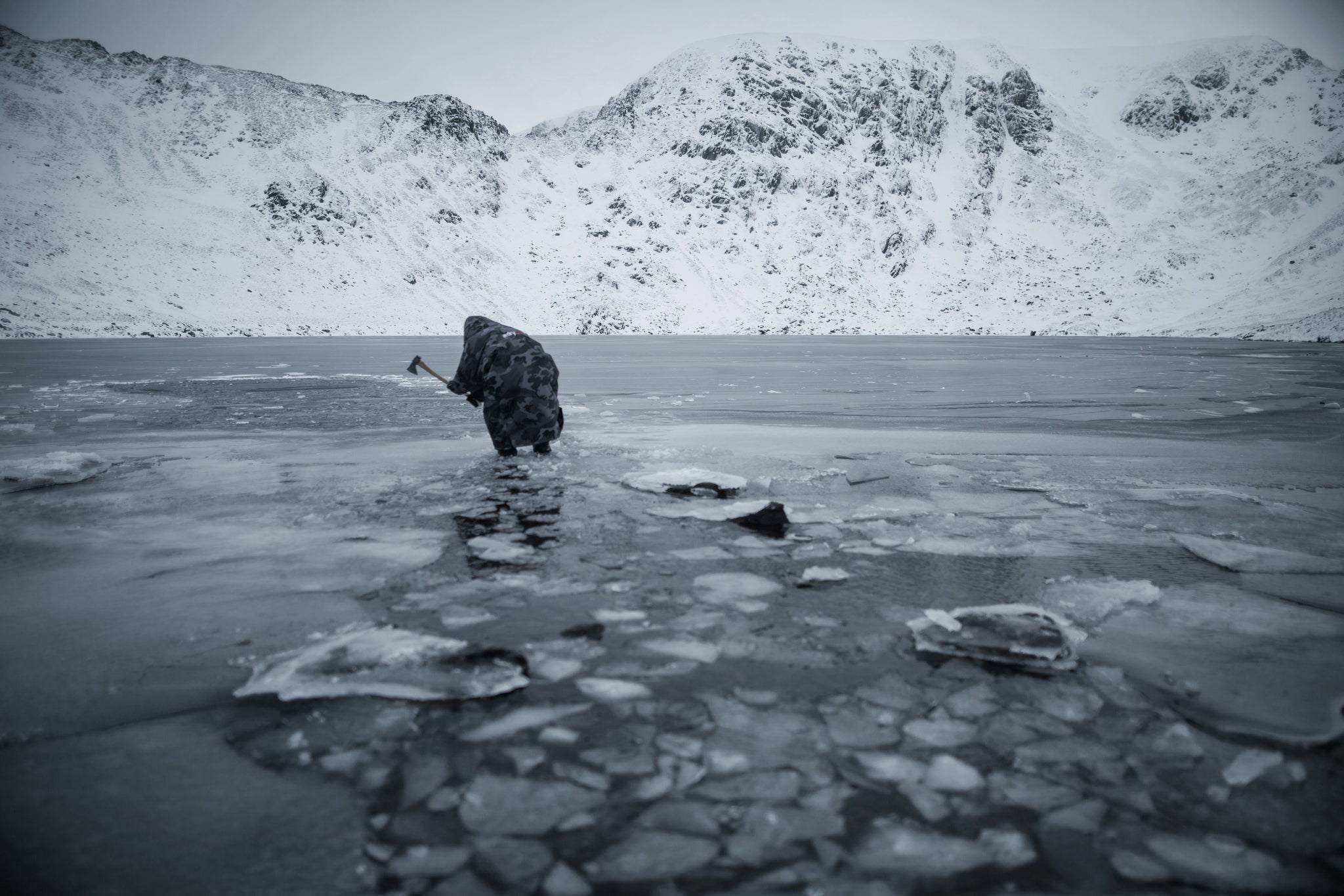 Jacob Tonkin smashing the ice at Red Tarn