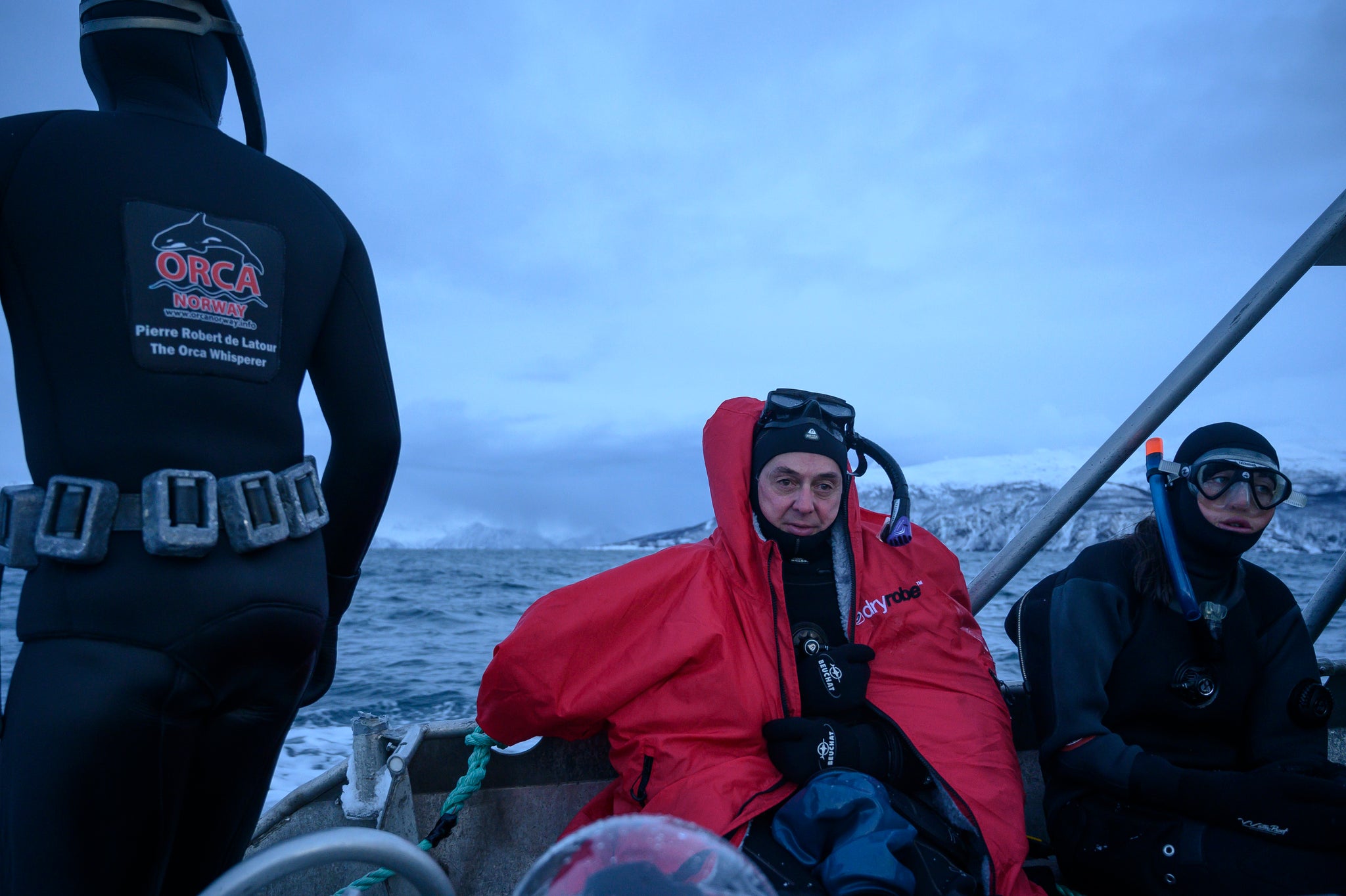Diver in dryrobe after filming orca whales 