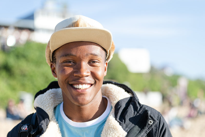 A young person at J Bay smiling at the camera