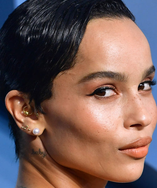 ce;ebrity ear piercings, zoe kravitz piericngs