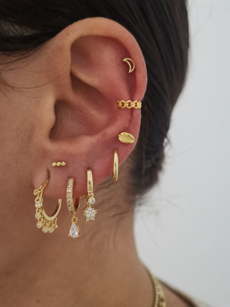 ear constellation, ear curation, multiple ear piercings