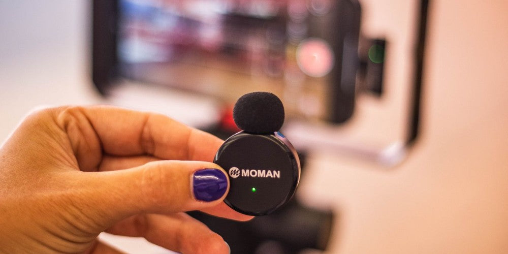 Moman CP2 microphone for iphone podcasting has a mini body with windmuff, being ideal for kinds of recording activities