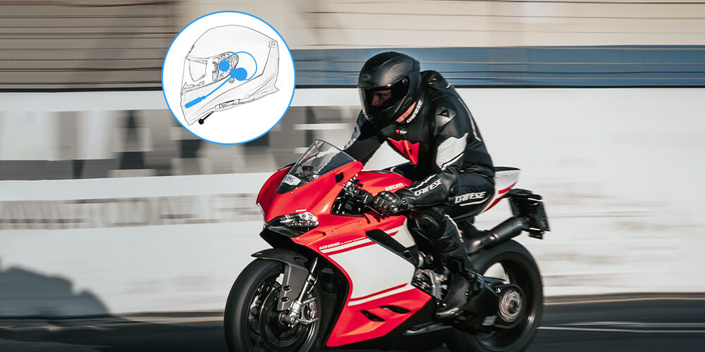 Moman H4 Bluetooth headset is mounted inside the motorcycle helmet. It is compact, budget, and easy to operate.