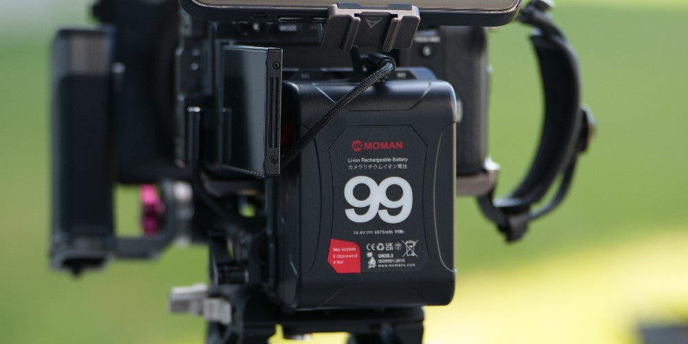 Moman Power 99 v-mount battery for LED lights can charge high-end video lights for hours when filming outdoors.