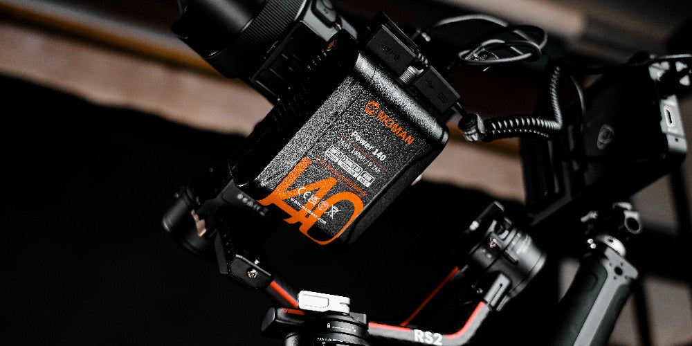 Moman Power 140 external v-lock battery for videography can be mounted on your camera rigs. It can charge your DSLR, monitor, wireless transmission at the same time.