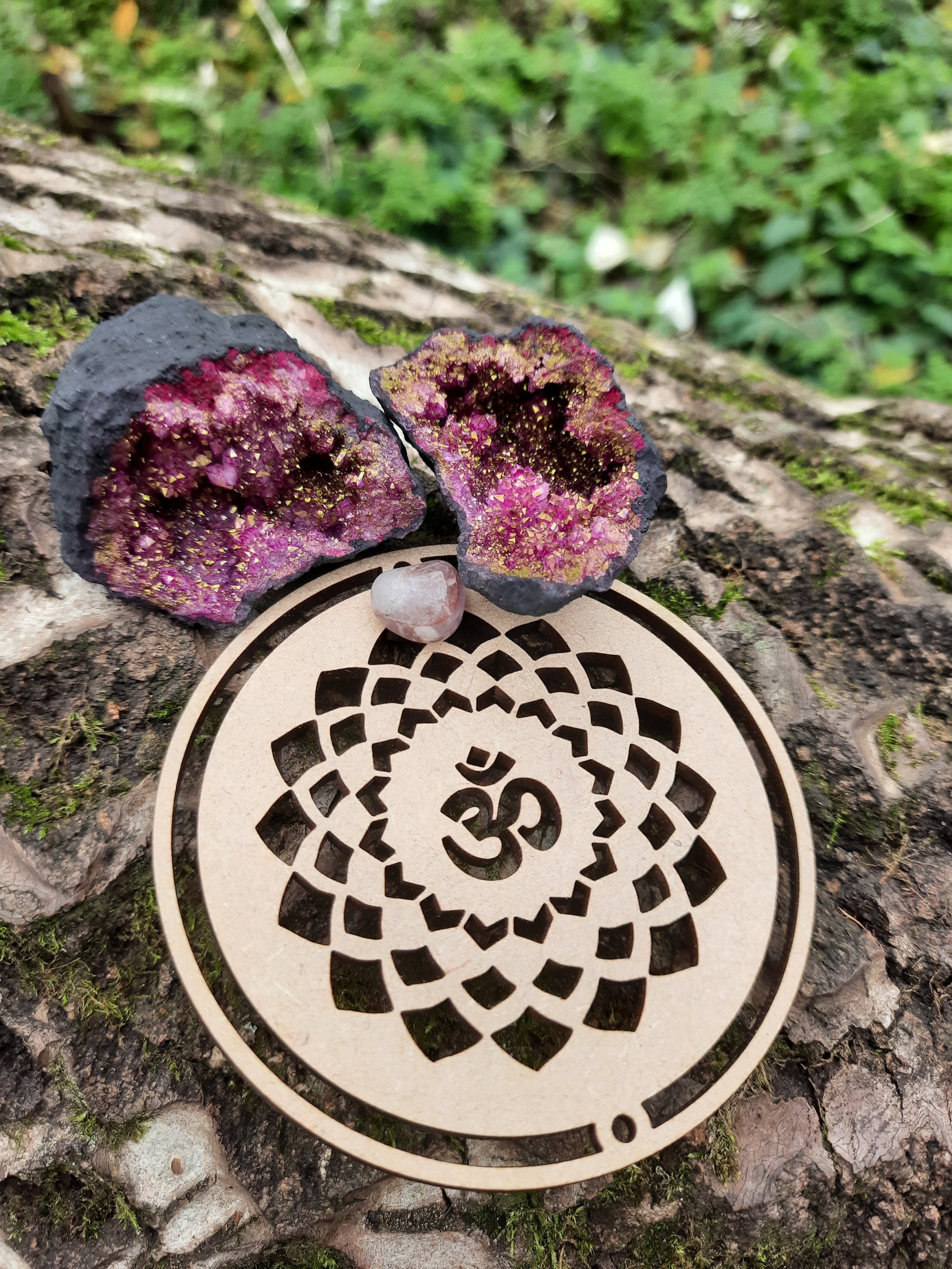 Tree trunk with on top Red Quartz Geode and our Wooden Crown Chakra Symbol