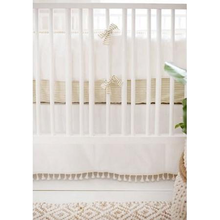 white and gold crib