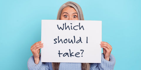 Image of Woman Holding Board Asking Which Supplement to Take