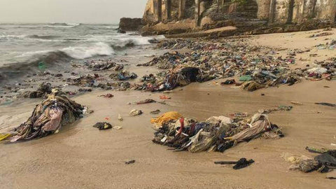 Image of clothing waste on the beach