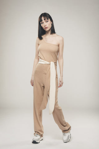 Image of light brown one-shoulder-jumpsuit by your sustainable clothing brand, Organique.