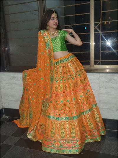 Photo of pink and orange lehenga