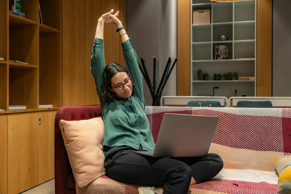 Woman stretching on the couch