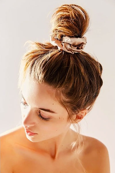 high bun scrunchies hairstyle