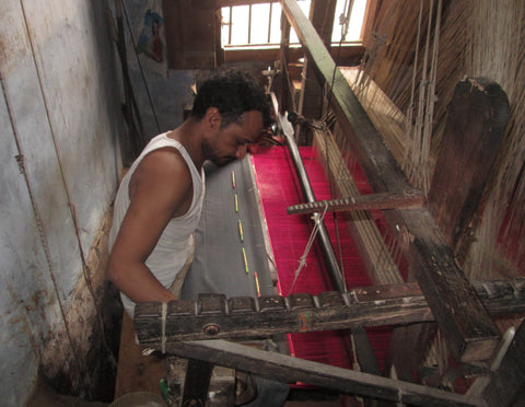 Weaver of Banaras at work with Handloom
