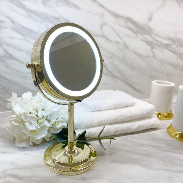 https://cdn.shopify.com/s/files/1/0399/4664/9758/products/adriana-gold-finish-led-table-mirror-bathroom-premier-480109.jpg?v=1641914572&width=600