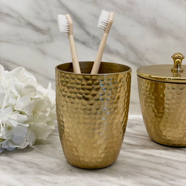 https://cdn.shopify.com/s/files/1/0399/4664/9758/products/sierra-hammered-gold-finish-tumbler-bathroom-premier-491918.jpg?v=1634136988&width=600