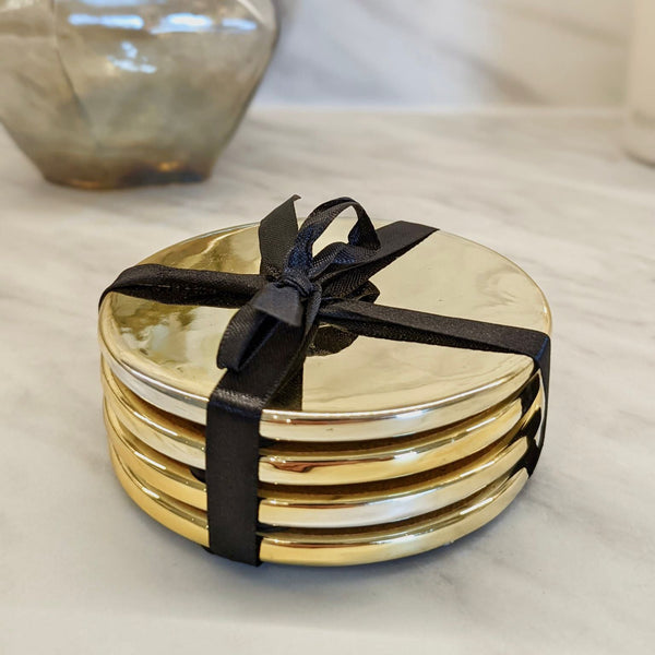 https://cdn.shopify.com/s/files/1/0399/4664/9758/products/thenon-set-of-4-gold-coasters-kitchen-premier-510101.jpg?v=1648216545&width=600